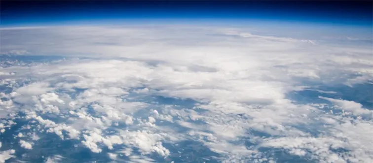 Which gas, abundantly present in the atmosphere, enables us to breathe?