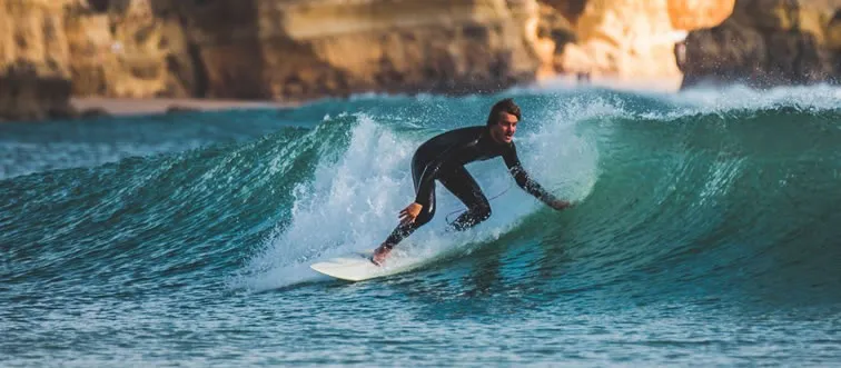 Who is widely credited as the father of modern surfing?